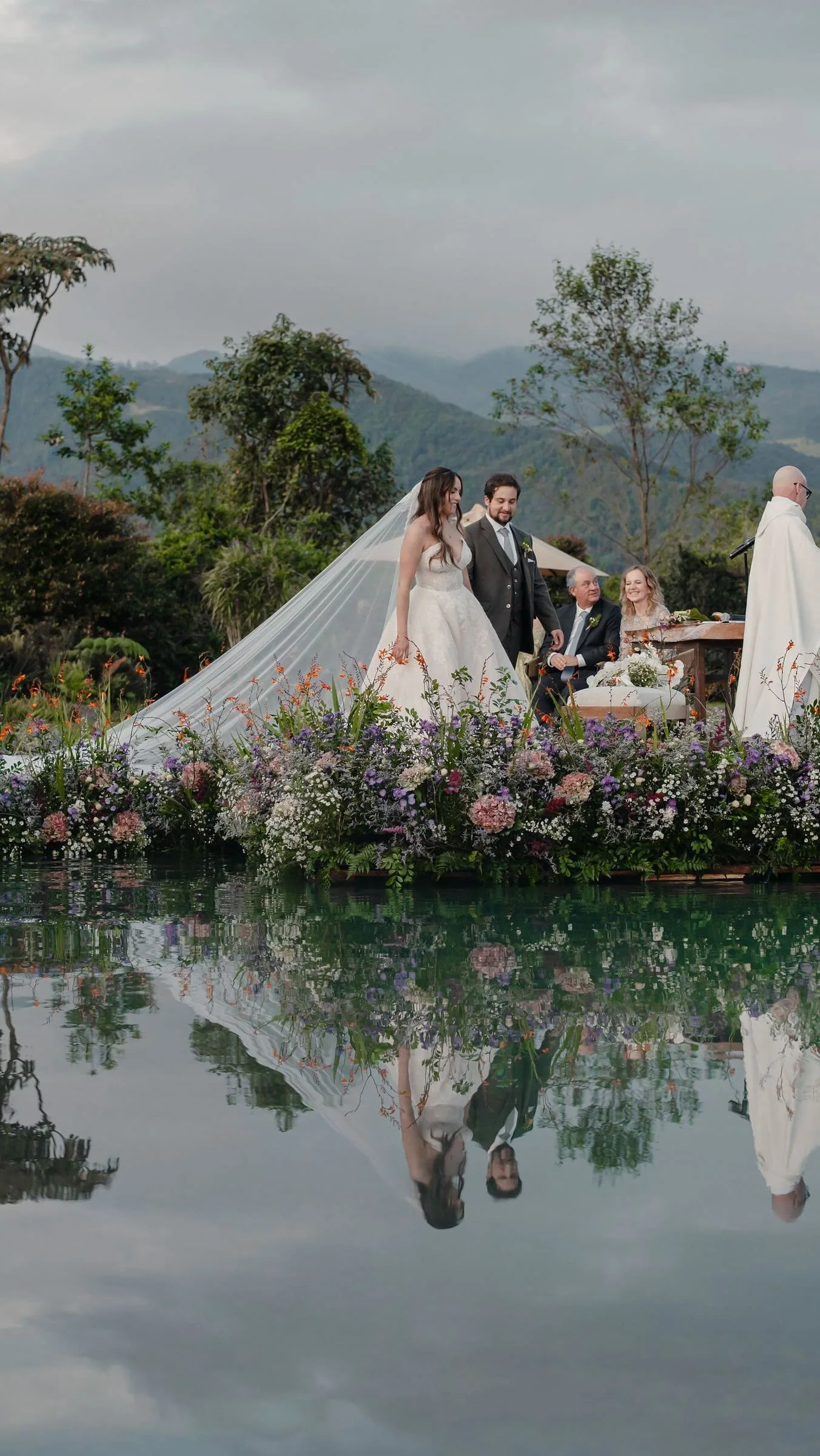 Ceremony by the lake with flowers